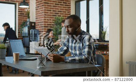 African american man holding speech bubble for recruitment 87122800