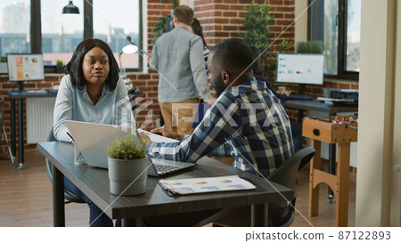 Female candidate meeting with male employee at job interview 87122893