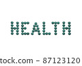 lettering with spirulina tablets the word health. Super food ingredient. top view 87123120