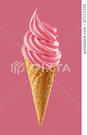 pink soft ice cream in waffle cone 87123358