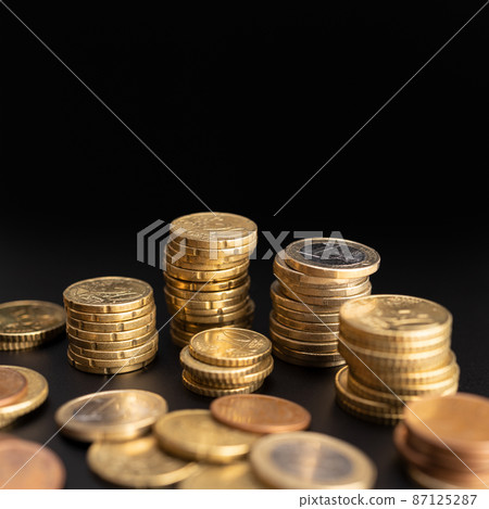 Background of Euro coins on black background. Currency Money. Copy space Background of Euro coins on black background. Currency Money. Copy space 87125287