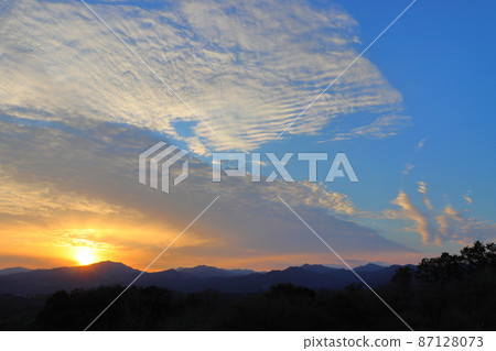 Sunset, blue sky, clouds, mountains, trees Sunset, blue sky, clouds, mountains, trees 87128073