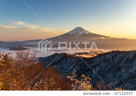 Mt. Fuji in the evening from Mitsutoge in the snowy landscape 87128357
