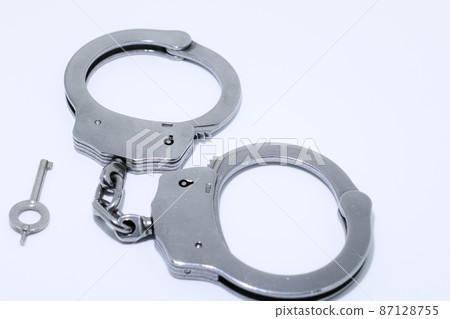Silver handcuffs / arrest image 87128755