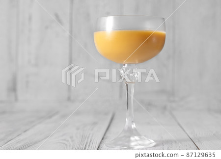 Glass of Eggs-cellent Cocktail 87129635