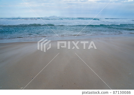 Raging winds and swelling waves 87130086