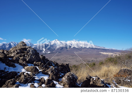 Beautiful mountains on a sunny winter day in the distance 87130336