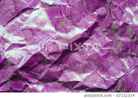 Crumpled shiny purple paper texture Crumpled shiny purple paper texture 87132324