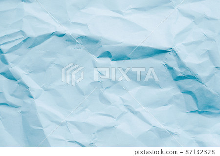 Crumpled light blue paper texture 87132328