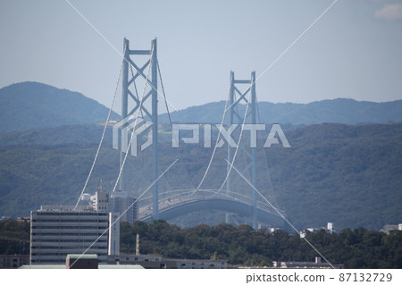 Zoom shot of Akashi Kaikyo Bridge from the south of Kobe Gakuen Zoom shot of Akashi Kaikyo Bridge from the south of Kobe Gakuen 87132729