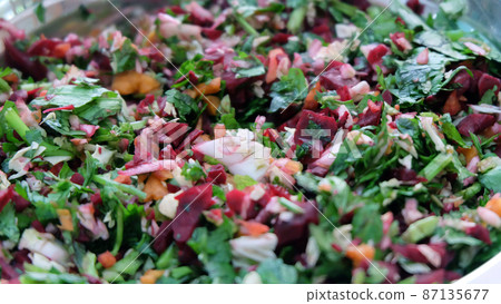 Close up of fresh and raw vegetable chop, with coriander leaves, pak choy, carrot and beetroot. 87135677
