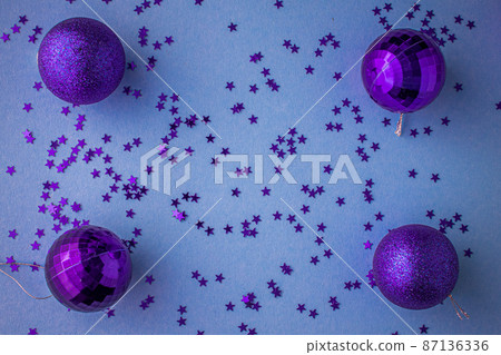 Christmas holidays composition, top view pink-purple-violet Christmas decorations on white-blue Christmas holidays composition, top view pink-purple-violet Christmas decorations on white-blue 87136336