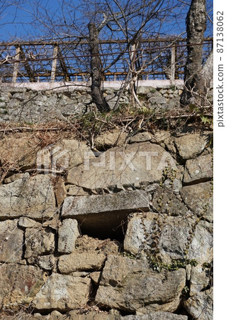 Drainage traces left on the stone wall of the castle Drainage traces left on the stone wall of the castle 87138062