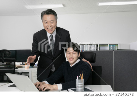 business concept asian korean old and young two men, different generations male man boss and employee concept, using laptop 87140178