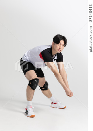 volleyball sports player, asian korean man with toss, tossing motion 87140418