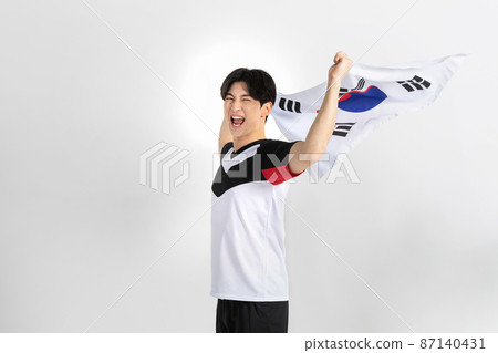 volleyball sports player, asian korean man holding Korean flag Taegeukgi 87140431