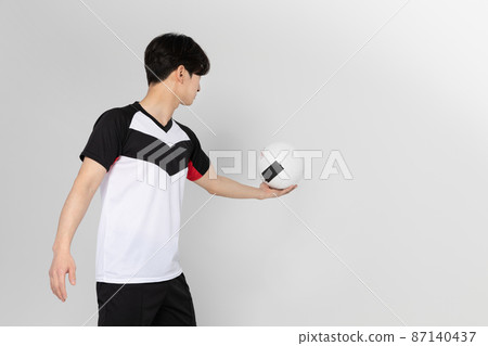 volleyball sports player, asian korean man holding ball volleyball sports player, asian korean man holding ball 87140437