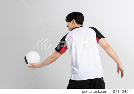 volleyball sports player, asian korean man preparing serve, serving the ball volleyball sports player, asian korean man preparing serve, serving the ball 87140464