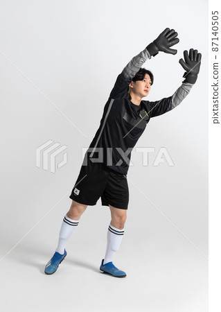 soccer football sports player, asian korean man with motions in studio background soccer football sports player, asian korean man with motions in studio background 87140505