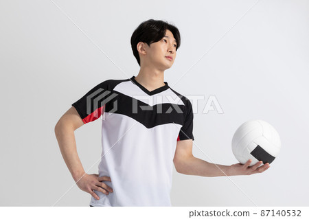 volleyball sports player, asian korean man holding ball volleyball sports player, asian korean man holding ball 87140532
