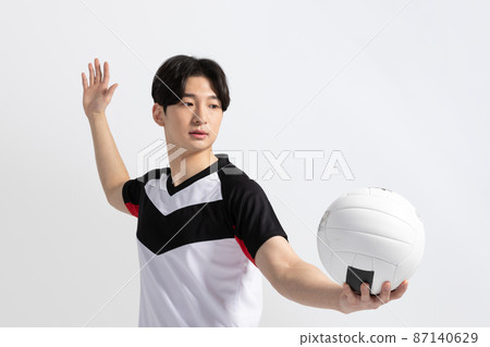 volleyball sports player, asian korean man preparing serve, serving the ball 87140629