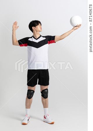 volleyball sports player, asian korean man preparing serve, serving the ball volleyball sports player, asian korean man preparing serve, serving the ball 87140678