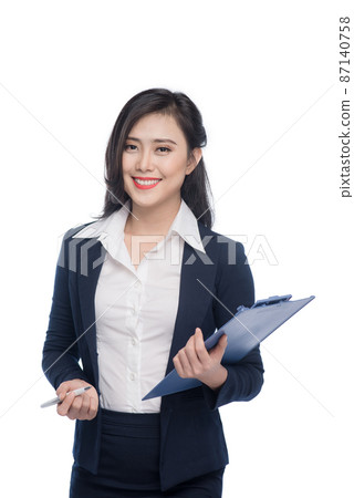 Portrait of an attractive young businesswoman with blue folder, isolated on white background Portrait of an attractive young businesswoman with blue folder, isolated on white background 87140758