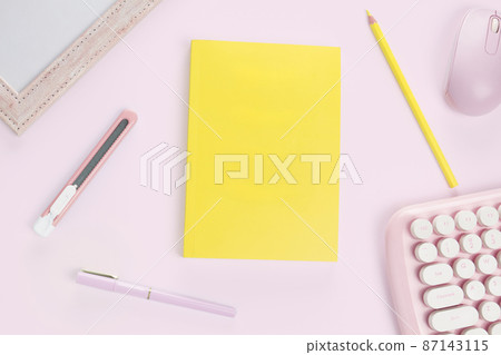 flat lay yellow color book and stationery 87143115