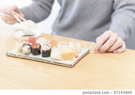 Variations of men eating sushi Variations of men eating sushi 87143809