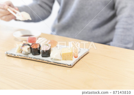 Variations of men eating sushi Variations of men eating sushi 87143810
