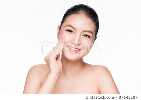 Facial treatment. Beautiful asian woman portrait with perfect skin. Facial treatment. Beautiful asian woman portrait with perfect skin. 87145197