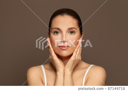 Perfect woman spa model on brown background Perfect woman spa model on brown background 87149718