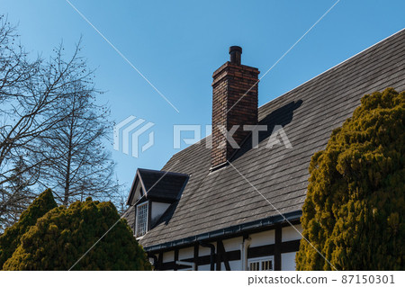 Roof with small windows and chimney Roof with small windows and chimney 87150301