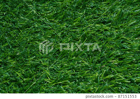 Close up artificial grass backgroud. Close up artificial grass backgroud. 87151553