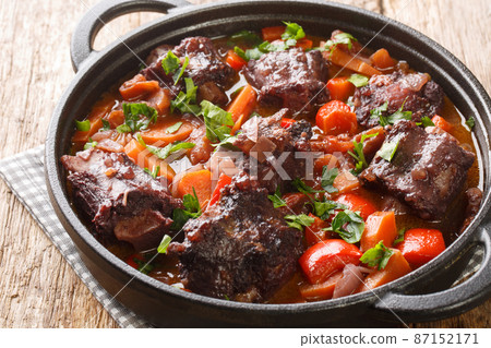 Estofado de Rabo de Toro Spanish Oxtail Stew closeup on a pot. Horizontal Estofado de Rabo de Toro Spanish Oxtail Stew closeup on a pot. Horizontal 87152171