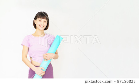 woman with yoga mat woman with yoga mat 87156825