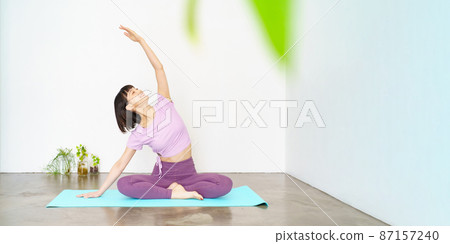 Women doing yoga and flexibility exercises Women doing yoga and flexibility exercises 87157240