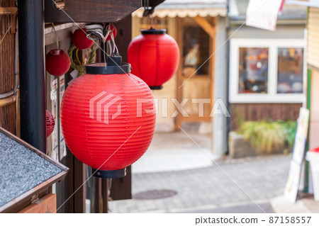 Red lanterns hanging under the eaves of the store - Stock Photo ...