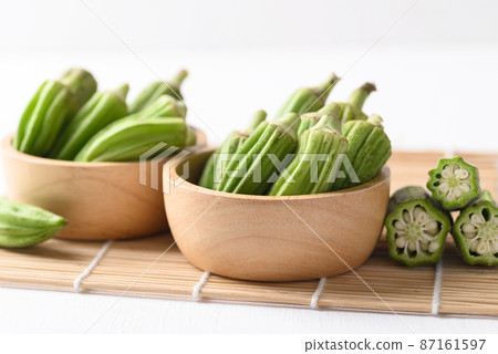 Green okra or ladies fingers (Edible green seed pods), Organic vegetables from local farmer market Green okra or ladies fingers (Edible green seed pods), Organic vegetables from local farmer market 87161597