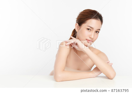 Beautiful young asian woman with clean fresh skin on white background, Face care, Facial treatment, 87163795