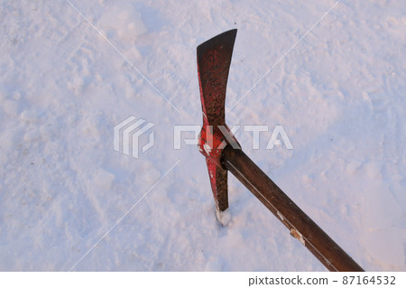 Pickaxe, tools, snow, winter, northern country, snow split, ice split, Japan, Hokkaido, snow country, outdoor, snow cover 87164532
