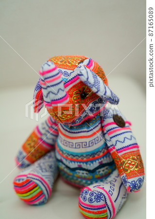 Stuffed elephant in Thai costume 87165089