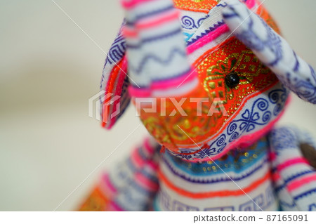 Stuffed elephant in Thai costume 87165091
