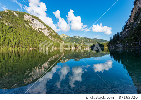 Pragser Wildsee or Lago di Braies - Small Beautiful Lake in Italian Alps Dolomites Pragser Wildsee or Lago di Braies - Small Beautiful Lake in Italian Alps Dolomites 87165320