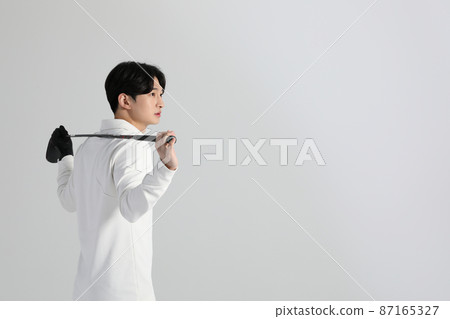 golf sports player, asian korean man with golf club in studio 87165327