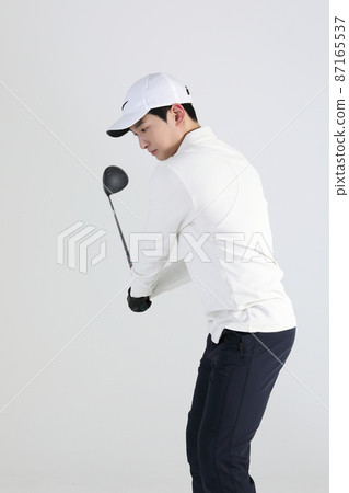 golf sports player, asian korean man with golf club in studio golf sports player, asian korean man with golf club in studio 87165537