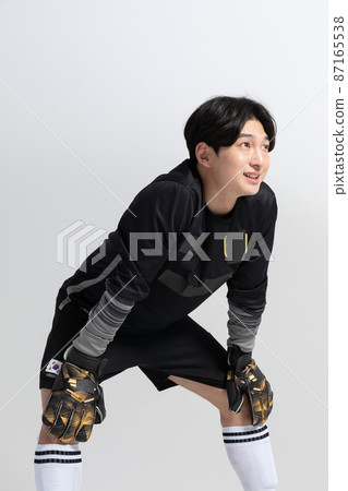 soccer football sports player, asian korean man with motions in studio background soccer football sports player, asian korean man with motions in studio background 87165538