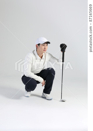 golf sports player, asian korean man with golf club in studio 87165669