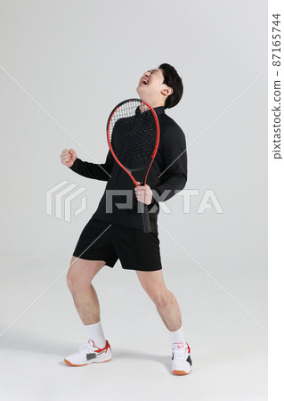tennis sports player, asian korean man with racket, studio 87165744