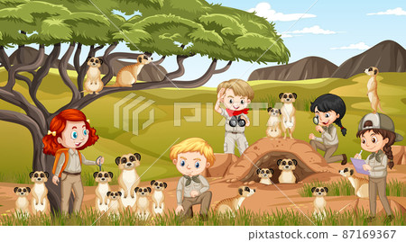 Children with meerkats in savanna forest 87169367
